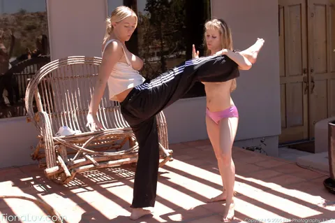 Fiona Luv: Busty Blondes in Shorts Kiss Outdoors After Karate Match – photo 11 of 15