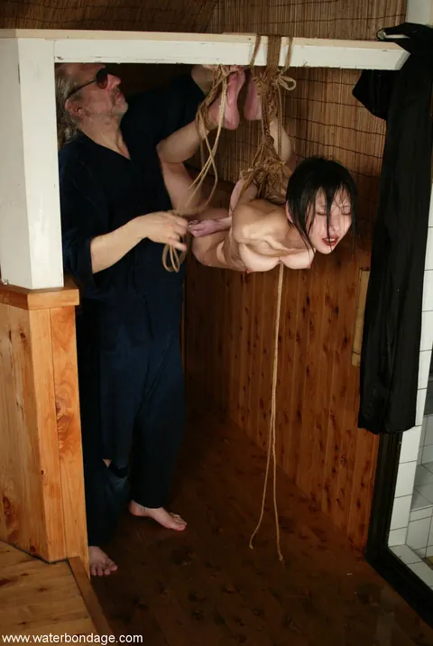 Bound Asian Brunette Spreads Her Pussy During Water Play – photo 10 of 20