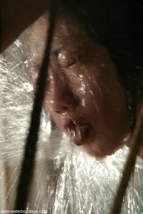 Bound Asian Brunette Spreads Her Pussy During Water Play – photo 5 of 20