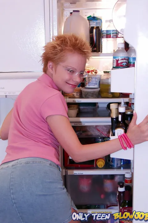 Emily Davinci: Short-Haired Redhead PAWG in a Skirt and Glasses Poses in the Kitchen – photo 6 of 21