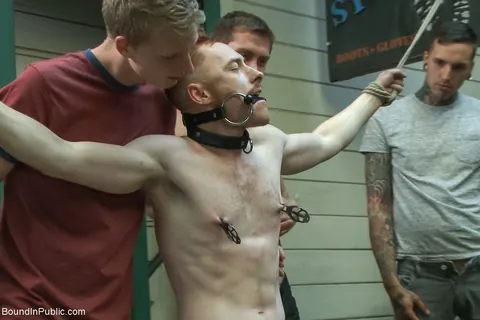 Two Men Bound Nude and Exposed in a Public Outdoor Space – photo 15 of 21