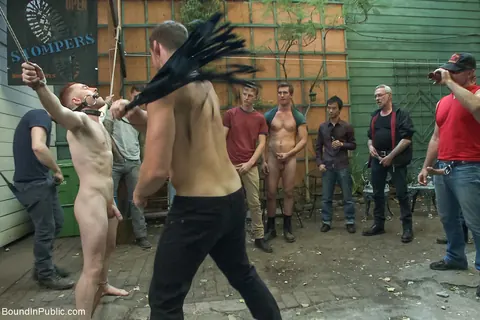 Two Men Bound Nude and Exposed in a Public Outdoor Space – photo 2 of 21
