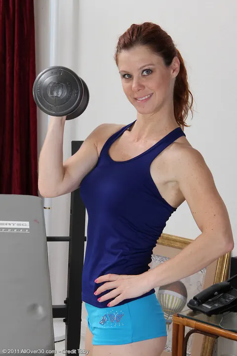 Jessica Adams: Redhead MILF Spreads Her Hairy Pussy in the Gym – photo 2 of 16