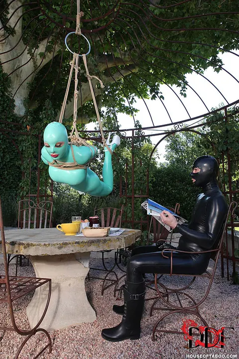 Latex Lucy: Busty Blonde MILF Suspended in Latex and Heels Outdoors – photo 6 of 16