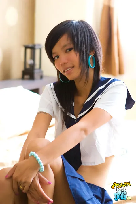 Slim Thai Strips Out of Her Uniform and Spreads – photo 1 of 21