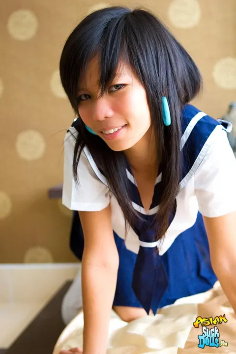 Slim Thai Strips Out of Her Uniform and Spreads – photo 6 of 21