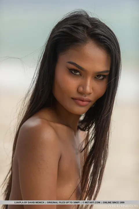 Asian Brunette Strips Out of Her Bikini on the Sandy Beach – photo 3 of 18