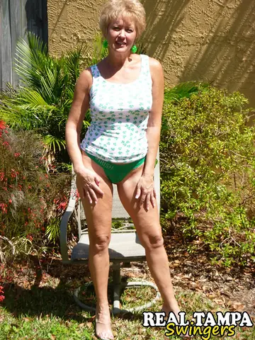 Mature Blonde Strips Out of Her Bikini and Spreads Her Ass in the Garden