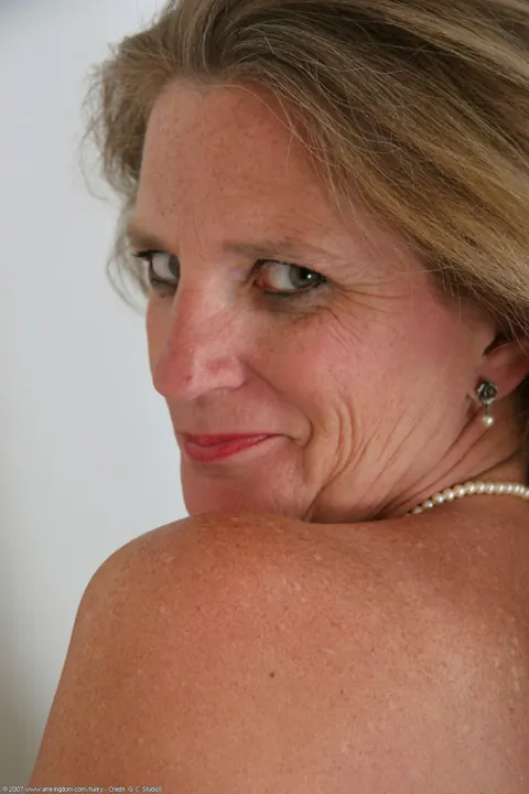 Curvy MILF Strips Off Her Lingerie and Fingers Her Hairy Pussy – photo 19 of 20