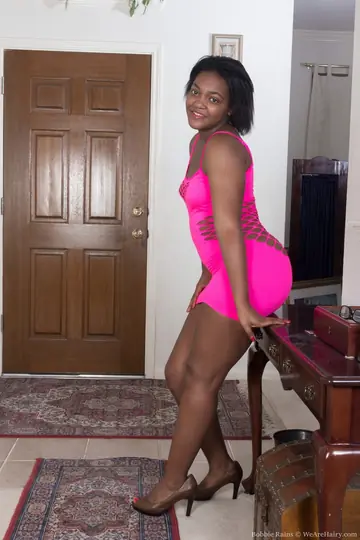Thick African MILF Lifts Her Dress and Spreads Her Hairy Pussy