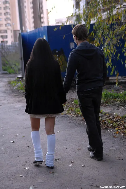 Asian Brunette in a Skirt Gives a Handjob Outdoors – photo 3 of 21