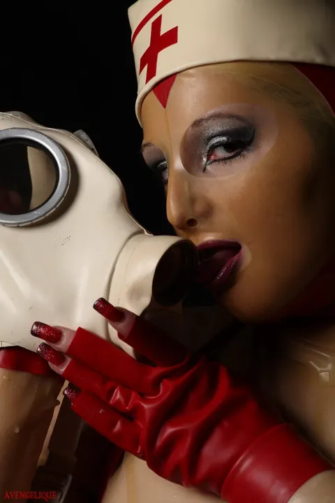 Blonde Nurse Poses in Latex Uniform and Heels – photo 11 of 16