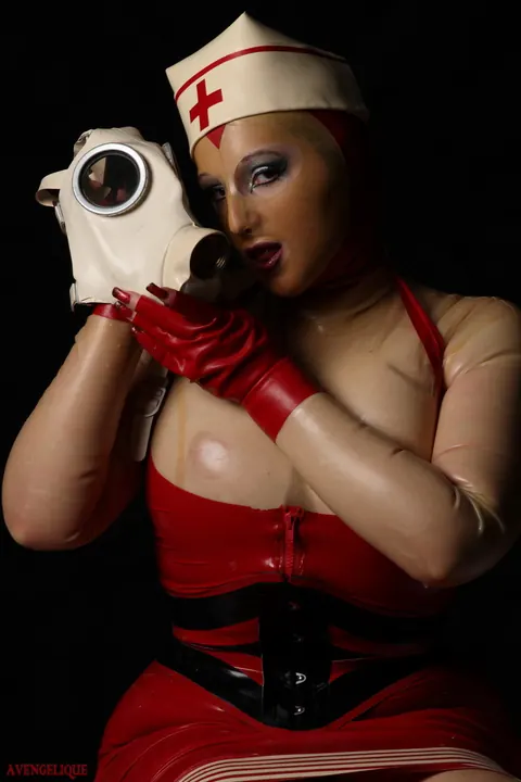 Blonde Nurse Poses in Latex Uniform and Heels – photo 10 of 16