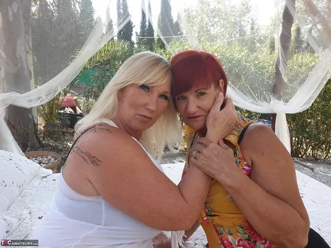 Mature Redhead and Curvy Partner Kiss and Undress – photo 2 of 16