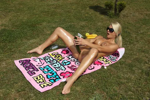 Pinky June: Blonde MILF Oils Her Shaved Pussy and Toys Herself Outdoors – photo 10 of 21