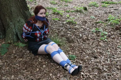 Pale Redhead Bound and Gagged in a Leather Skirt Outdoors – photo 12 of 16