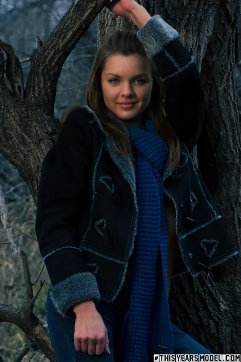 Michelle Jean: Brunette Undresses Out of Her Jeans Against a Tree – photo 1 of 10