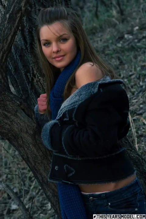 Michelle Jean: Brunette Undresses Out of Her Jeans Against a Tree – photo 2 of 10