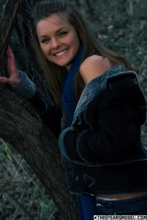 Michelle Jean: Brunette Undresses Out of Her Jeans Against a Tree – photo 3 of 10