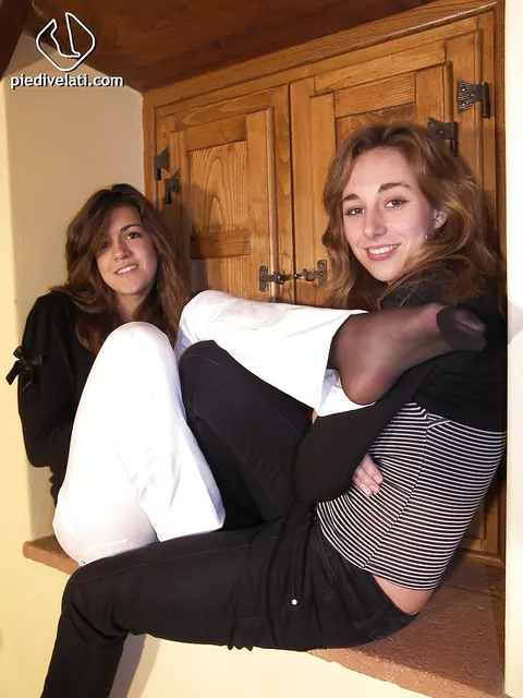 Two Women Pose Together Showing Off Their Legs – photo 13 of 16