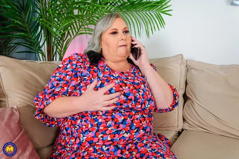 Curvy European MILF Poses in a Summer Dress on the Sofa – photo 12 of 20