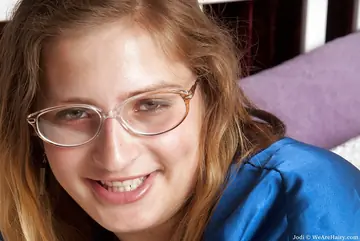 BBW Redhead in Lingerie and Glasses Shows Off Her Big Tits