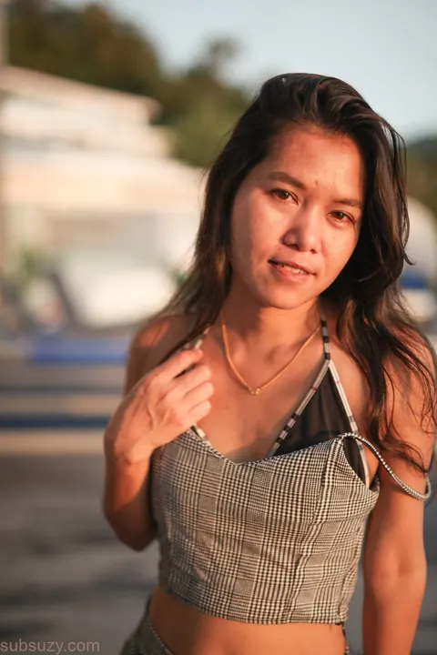 Asian Woman Poses and Shows Her Figure – photo 1 of 15