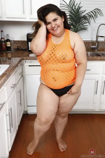 Latina BBW Undresses and Shows Her Hairy Pussy
