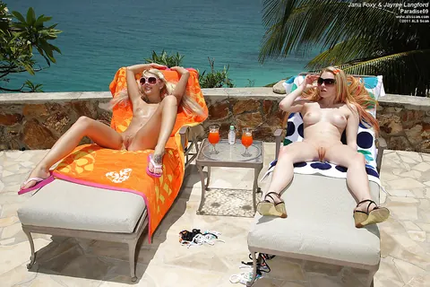 Jana Jordan: Blonde in a Bikini and Glasses Licks and Fists Outdoors – photo 10 of 16