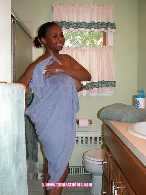 Curvy Ebony Woman with Big Tits Undresses in the Bathroom – photo 13 of 20