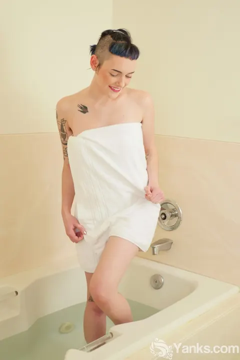 Tall Woman Pleasures Her Hairy Pussy with a Dildo After a Bath – photo 1 of 17