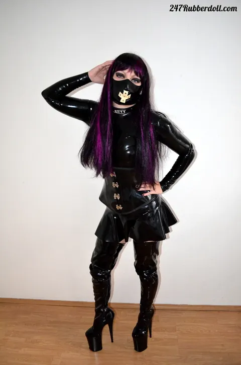 RubberDoll: Busty Brunette in Latex Strips and Poses Nude – photo 9 of 15