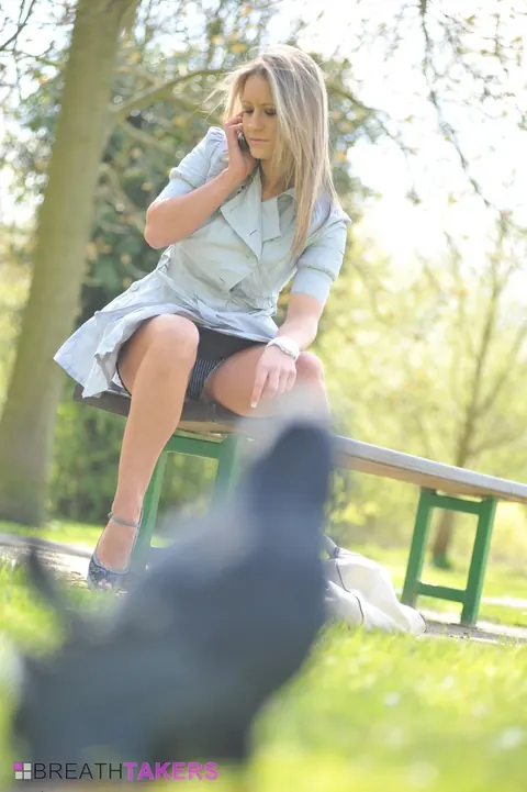 Blonde Flashes Her Panties in a Skirt and Heels on a Public Bench – photo 9 of 12