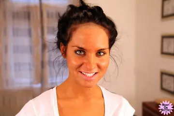 Tanned Brunette with Short Hair Takes a Facial After Sex