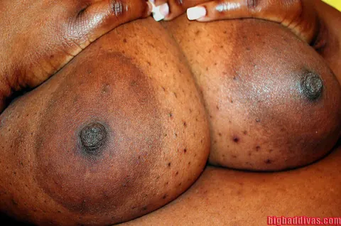 Ebony MILF Frees Her Massive Tits on a Chair in Heels – photo 9 of 12