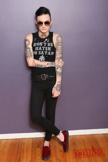Slim Tattooed Brunette in Glasses Takes Double Penetration in a Threesome