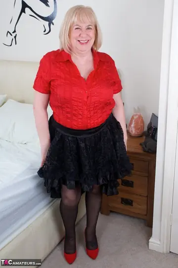 British BBW with Big Natural Tits Poses in Lingerie and Stockings on the Bed