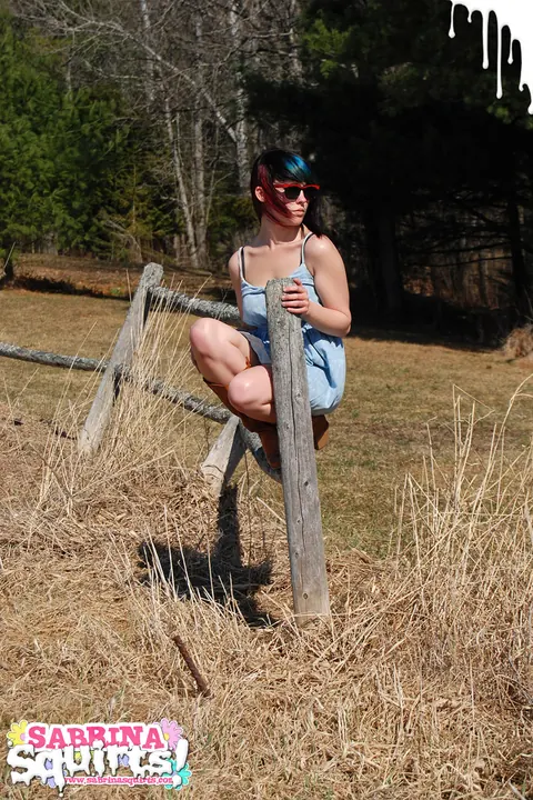 Sabrina Squirts: Curvy Brunette in Glasses, Skirt and Boots Bares Her Big Ass Outdoors – photo 1 of 12