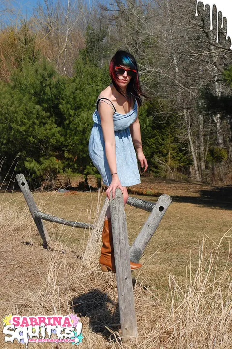 Sabrina Squirts: Curvy Brunette in Glasses, Skirt and Boots Bares Her Big Ass Outdoors – photo 4 of 12