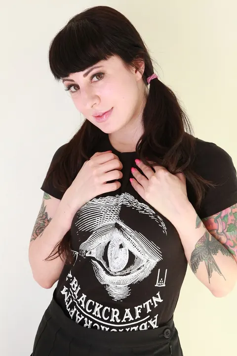 Dollie Darko: Tattooed Brunette Reveals Her Big Ass and Enhanced Tits – photo 4 of 16