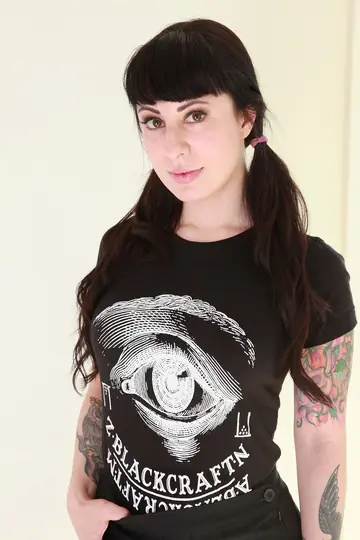 Dollie Darko – Tattooed Brunette Reveals Her Big Ass and Enhanced Tits