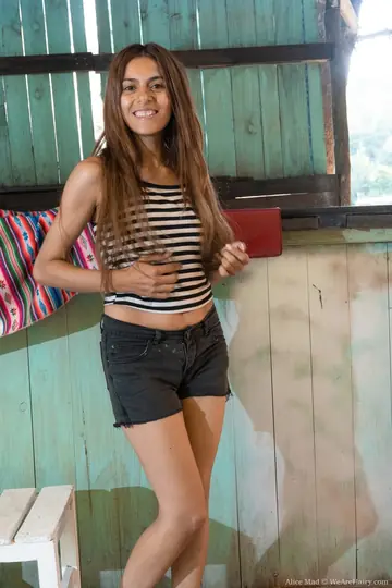 Slim Brunette Amateur Undresses and Spreads Her Hairy Pussy Wide