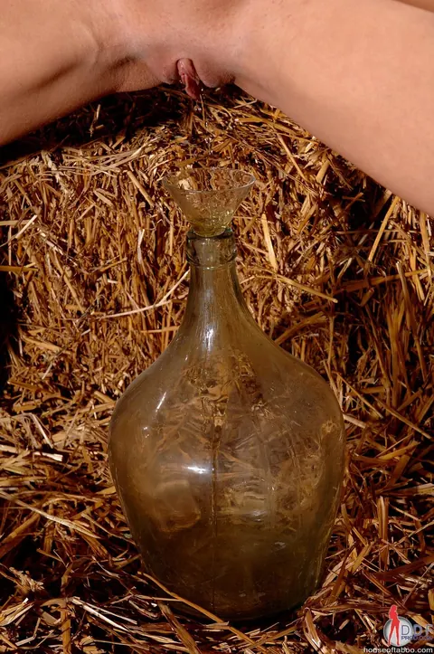 Slim Blonde in Bondage Sucks a Glass Bottle in the Bathroom – photo 9 of 21