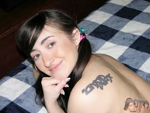 Tifa Quinn: Busty Latina in Pigtails Spreads Her Pussy on the Bed – photo 13 of 16