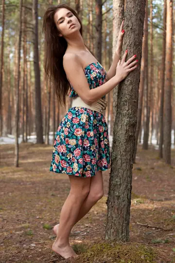 Hairy Woman Poses Nude in the Forest