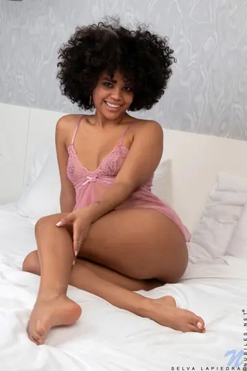 Petite Curly Ebony Brunette Fingers and Rides a Dildo Solo