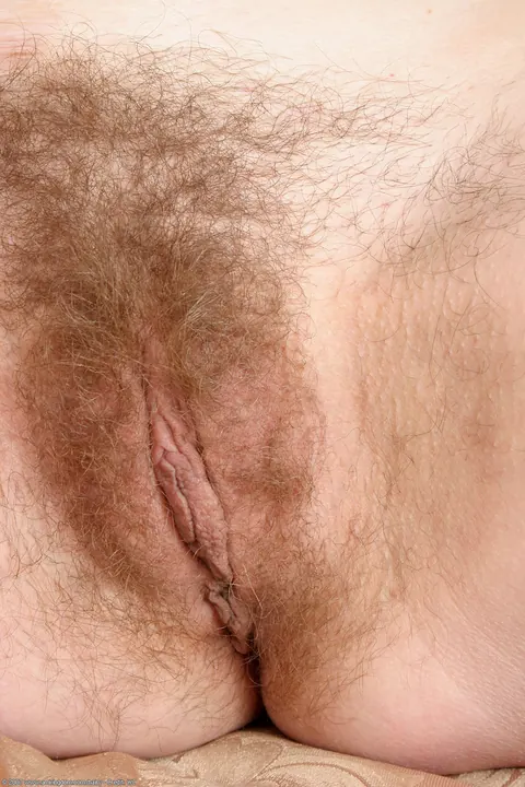 Hairy Brunette Strips Off Her Panties and Fingers Her Bush – photo 14 of 21