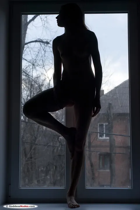 Skinny Woman Spreads Her Legs at the Window – photo 1 of 21