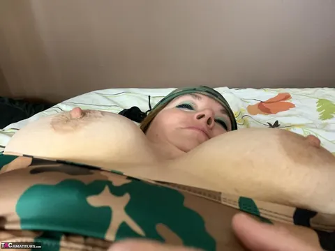 BBW MILF Works a Dildo in Her Ass on the Bed – photo 12 of 16