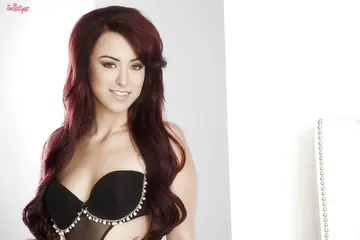 Redhead Strips Out of Her Lingerie and Spreads Her Pierced Pussy